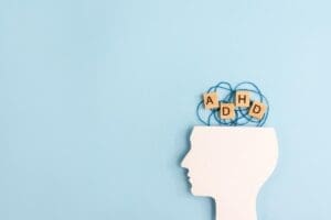 image of a head with adhd letters coming out to symbolize undiagnosed adhd in adults