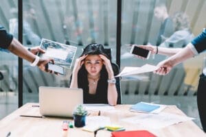 woman stressed at works wonders about stress management techniques