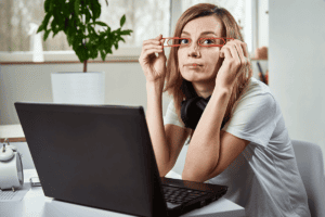 Person learning the connection between ADHD and autism while on their laptop