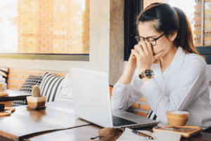 Person experiencing the link between procrastination and ADHD