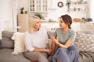 Two people talking about whether ADHD is genetic or not