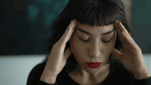 Person struggling with ADHD and anxiety