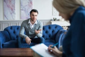 Person at in-person therapy