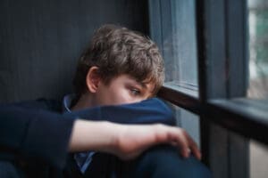 Person thinking about depression in teens