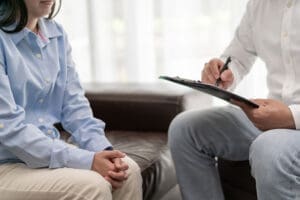 Person engaging in cognitive-behavioral therapy