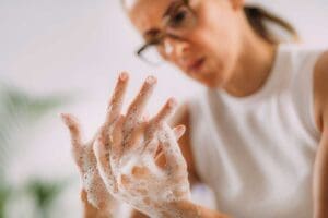 Person thinking about the signs of OCD