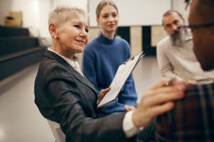 people in a group setting wonder if tms therapy in boston is right for them